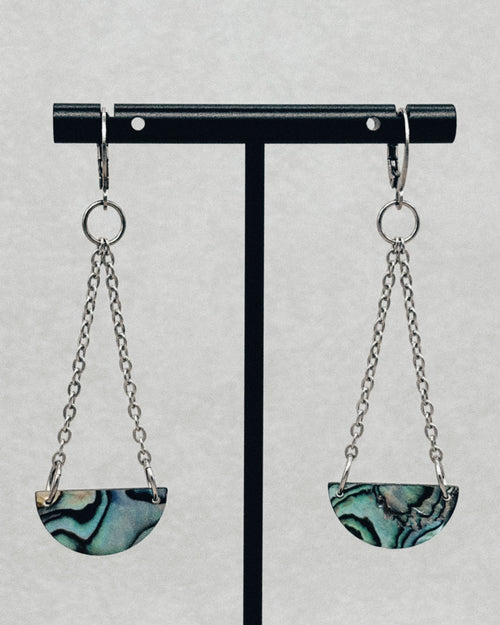 Abalone Half Circle Silver Chain Dangles with iridescent green and black patterned shell on silver chains hanging from hoops