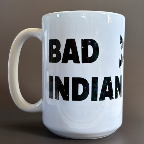 White ceramic Bad Indian Mug, Galaxy Print with bold galaxy-themed text on large 16 oz coffee mug
