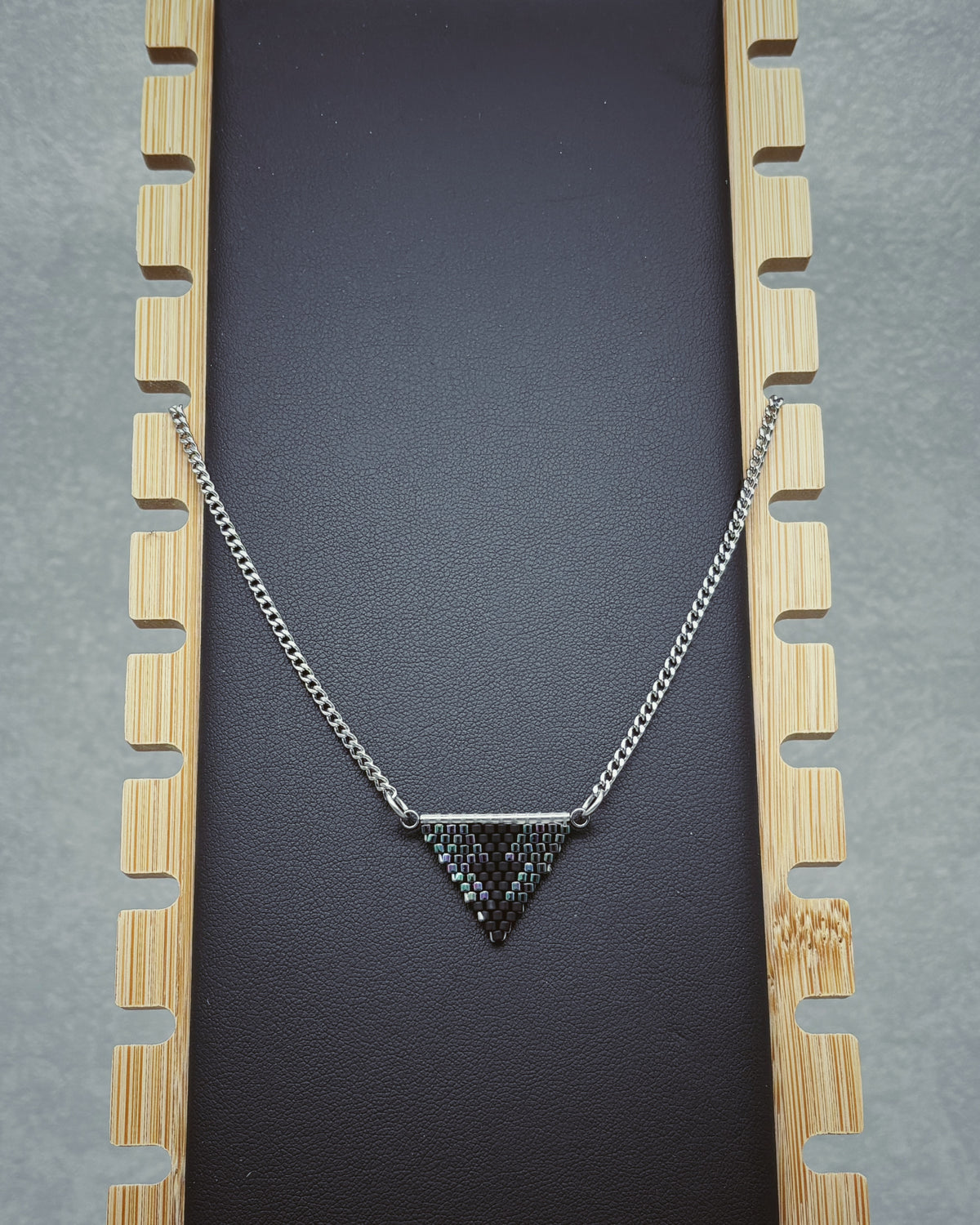 Rainbow and Matte Black Sturgeon Beaded Necklace with colorful triangular pendant