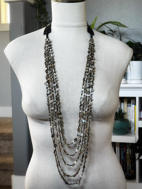5 Strand Red Abalone Nugget Necklace displayed on a mannequin with natural light and indoor plants in the background