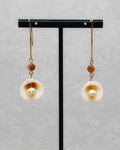 Clam, Pearl, and Sunstone Dangles featuring delicate shells with pearls and warm sunstone beads on gold-tone hooks