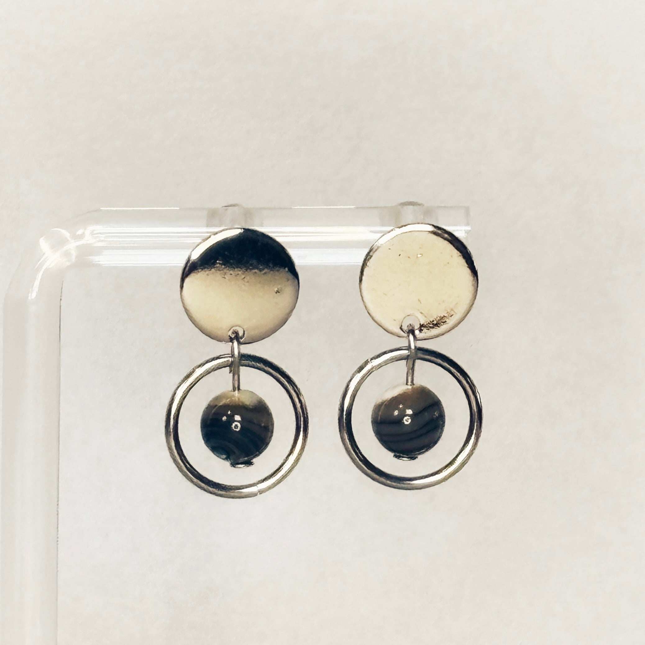 Abalone Sphere Silver Circle Studs featuring hammered silver discs with dangling rings and luminous abalone spheres gallery 1