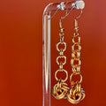 Copper Knot Dangles featuring linked copper rings and an intricate Algerian knot, lightweight and handmade indigenous jewelry