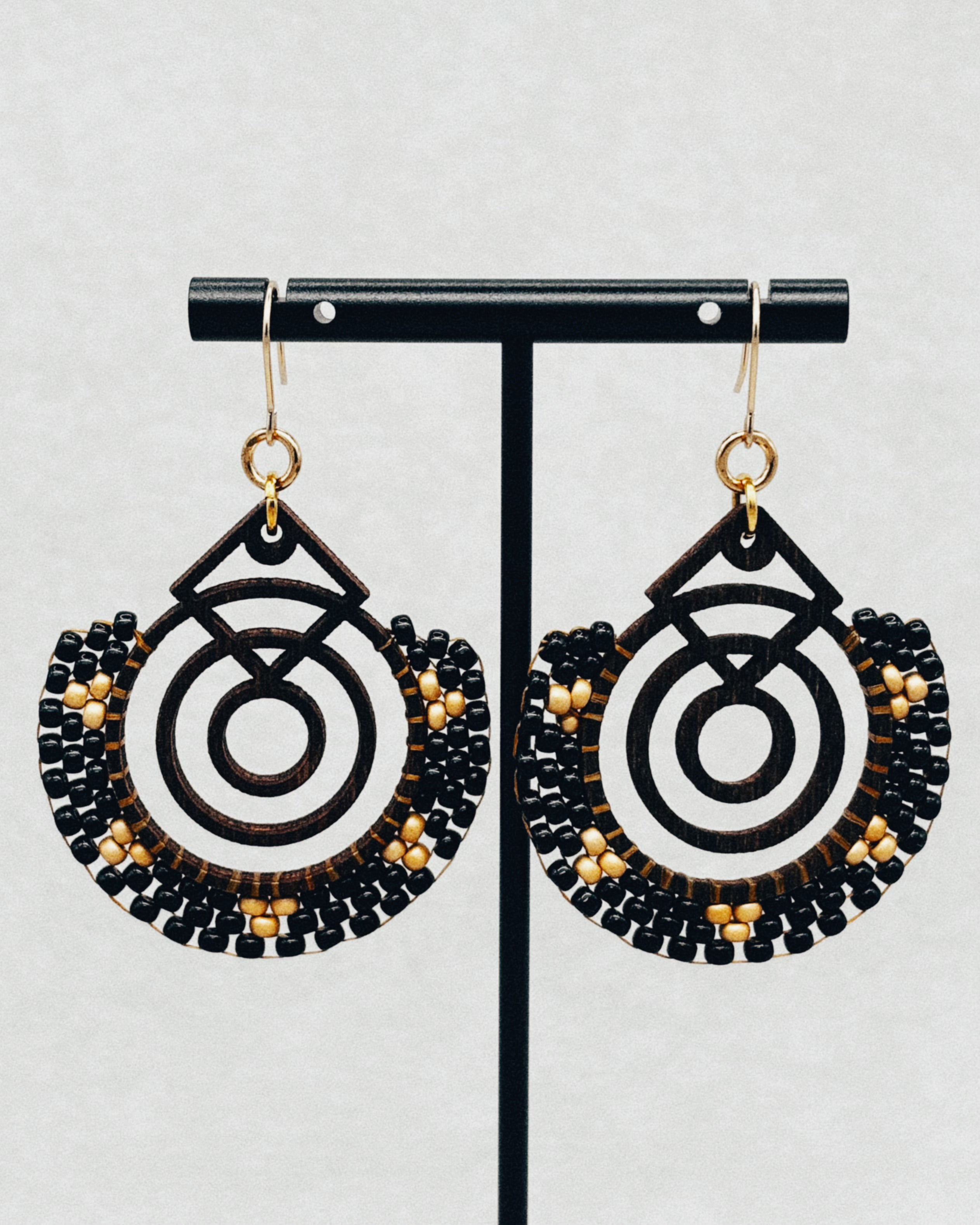 Walnut Brick Stitch Hoop Dangles featuring concentric walnut hoops with black and tan seed bead brick stitch accents.