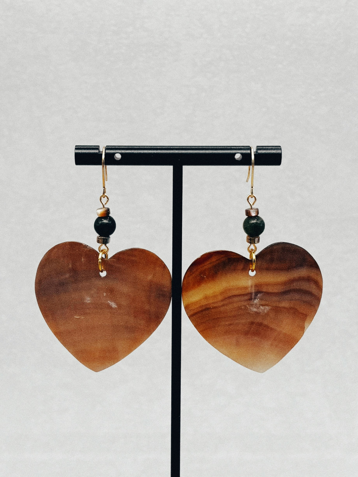 Brown Heart Dangles handmade beaded earrings with polished wooden heart charms and dark beads