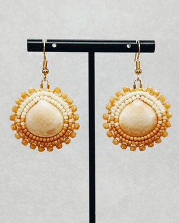 Two-Tone Tan Beaded Clamshell Dangles featuring circular cream clamshell centers with tan beaded borders in handmade style
