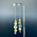 Graduated Abalone Coin Silver Drops with five iridescent abalone discs hanging on delicate silver chains