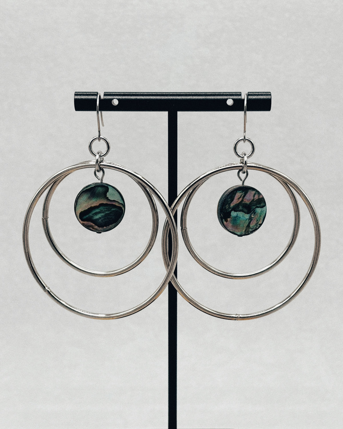 Steel Double Hoop Dangles with Abalone Coins featuring silver double hoops and round abalone inlays