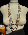 Three Strand Purple Abalone Star Button Necklace with layered iridescent star-shaped shell beads and small accent beads