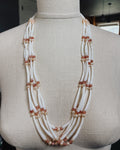 Five Strand Pearl and Sunstone Dentalium Necklace with white elongated beads and warm sunstone accents on layered strands