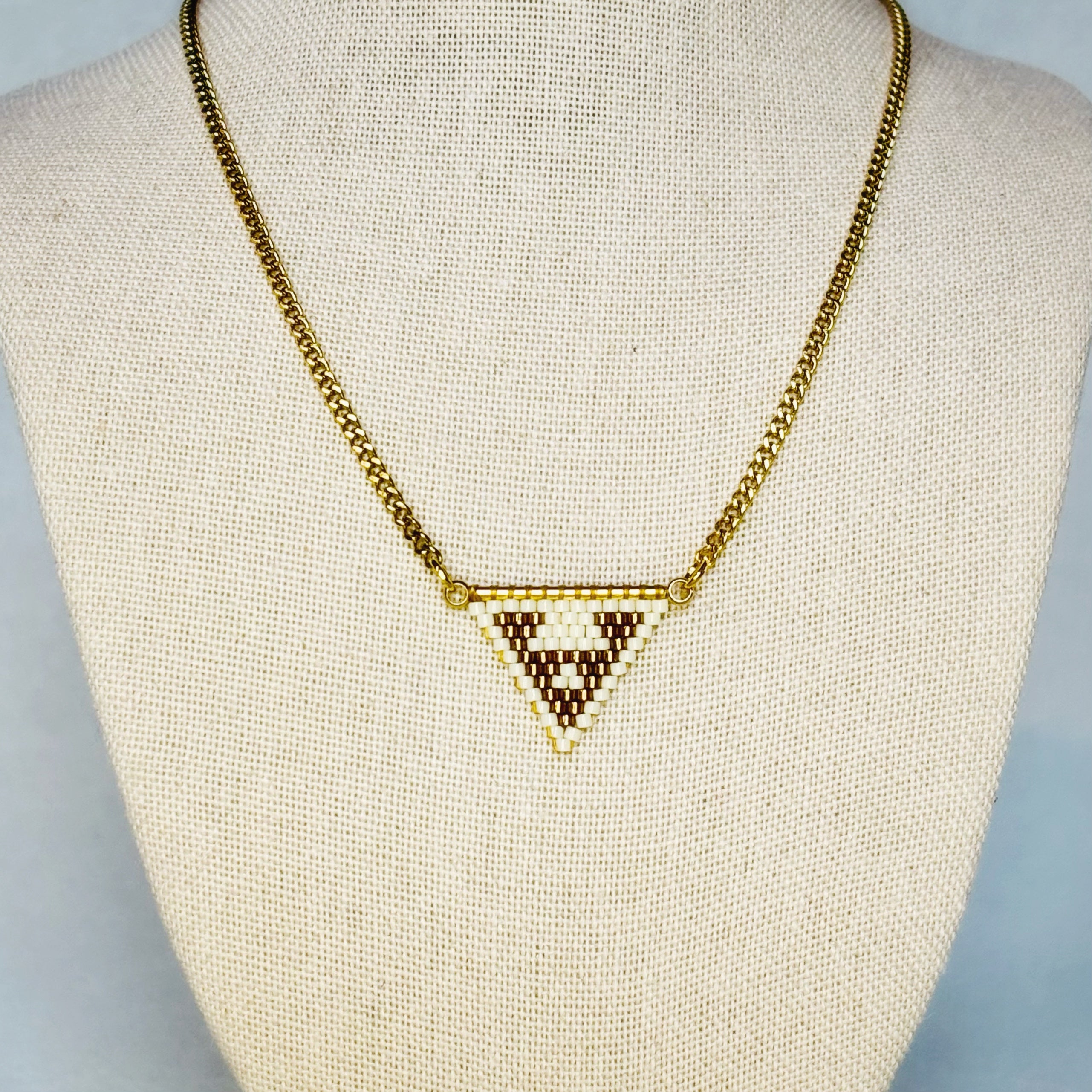Cream and Bronze Crab Beaded Necklace with geometric triangle pendant featuring a basket-inspired design gallery position 1