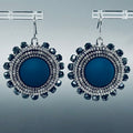 Matte Blue and Silver Beaded Dangles featuring handcrafted flat stitch design with matte blue resin center and silver seed beads