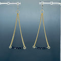 Black Gold Chain Drops featuring delicate gold chains with faceted black glass beads in elegant triangular drops