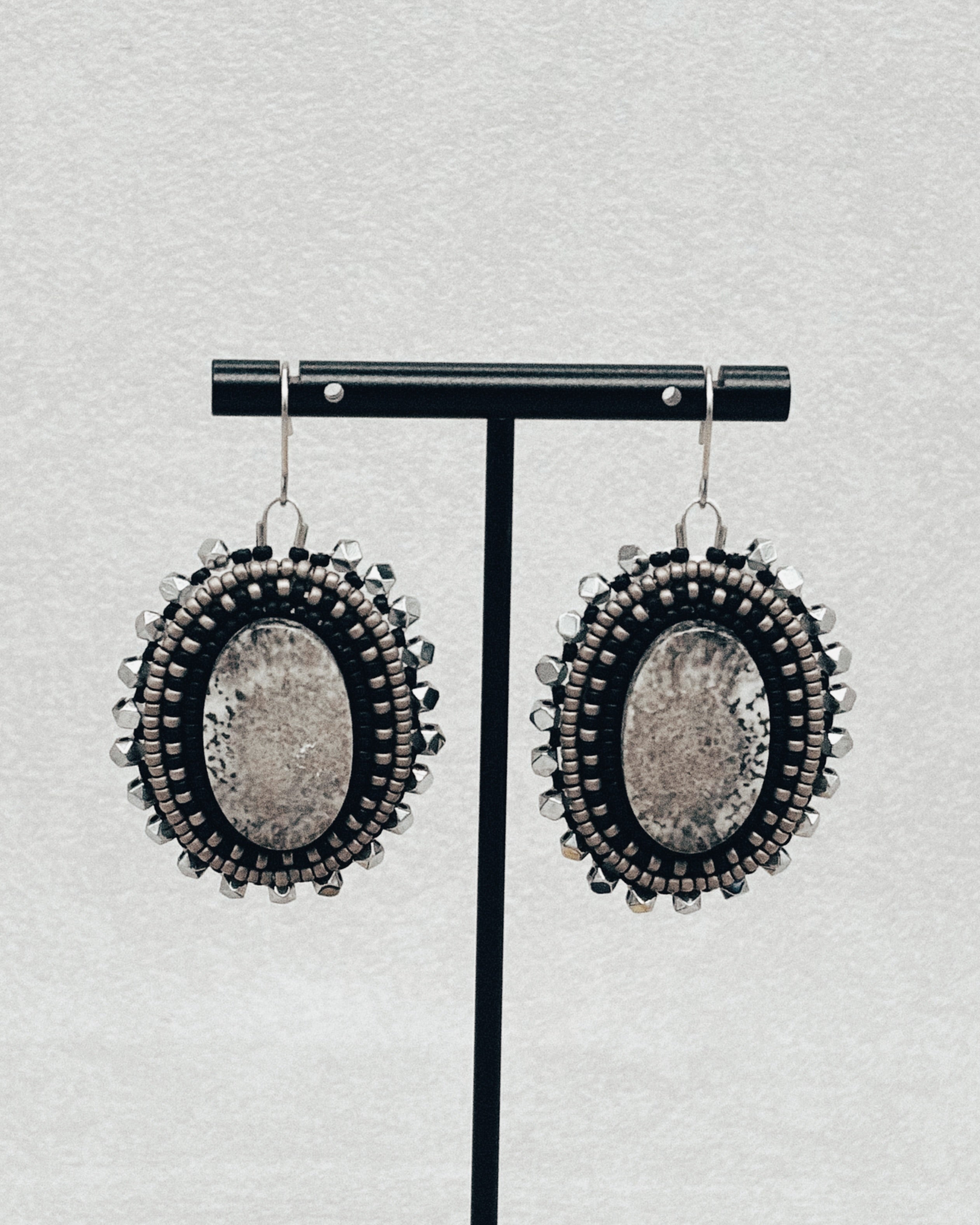 Black and Silver Beaded Fossil Dangles 2 handmade beaded earrings with oval fossil centers