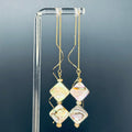 Double Abalone Diamond Gold Drops featuring two iridescent abalone diamond beads on delicate 3-inch gold ear chains
