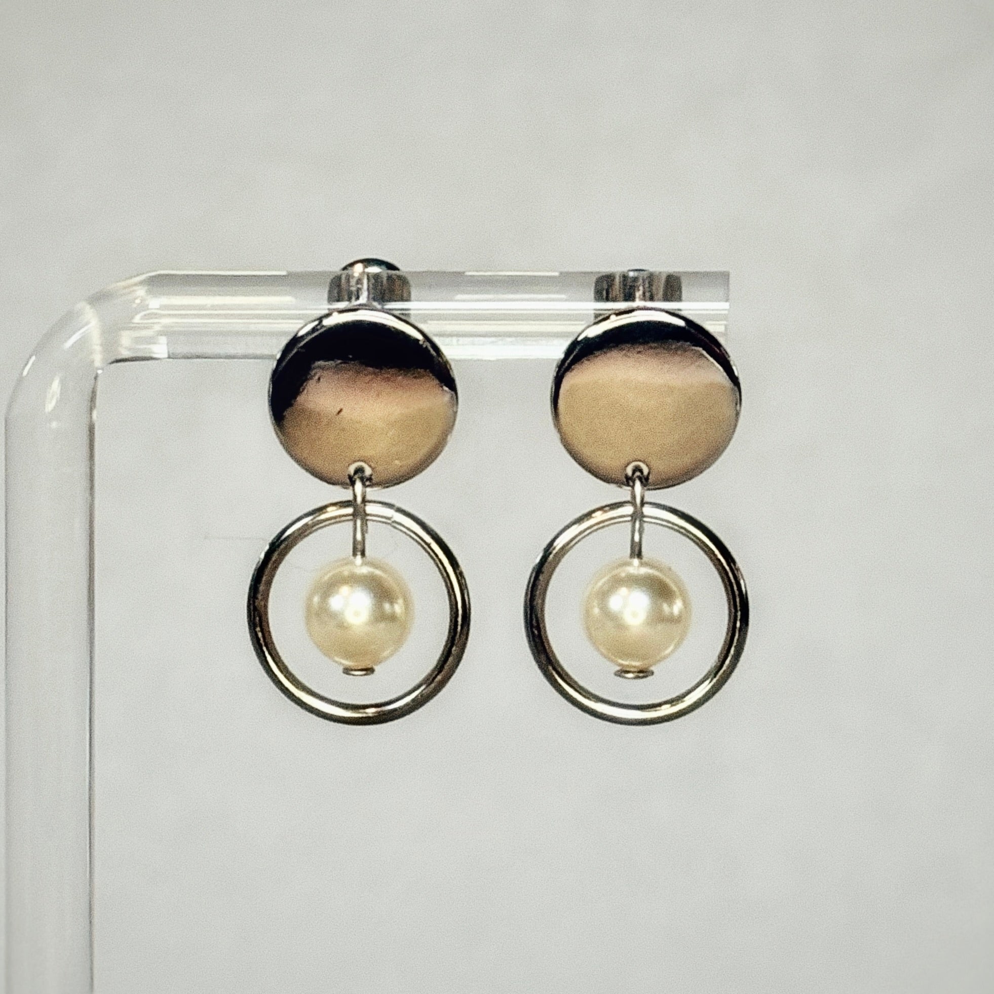 Pearl Silver Circle Studs with silver jump ring dangles featuring luminous 6mm pearls, displayed in gallery position 1