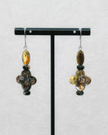 Abalone Quatrefoil Set featuring iridescent quatrefoil shapes and oval beads with dark accent beads on silver hooks