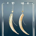 Abalone Lip Silver Drops featuring elongated curved abalone rims on delicate silver threader chains with adjustable length