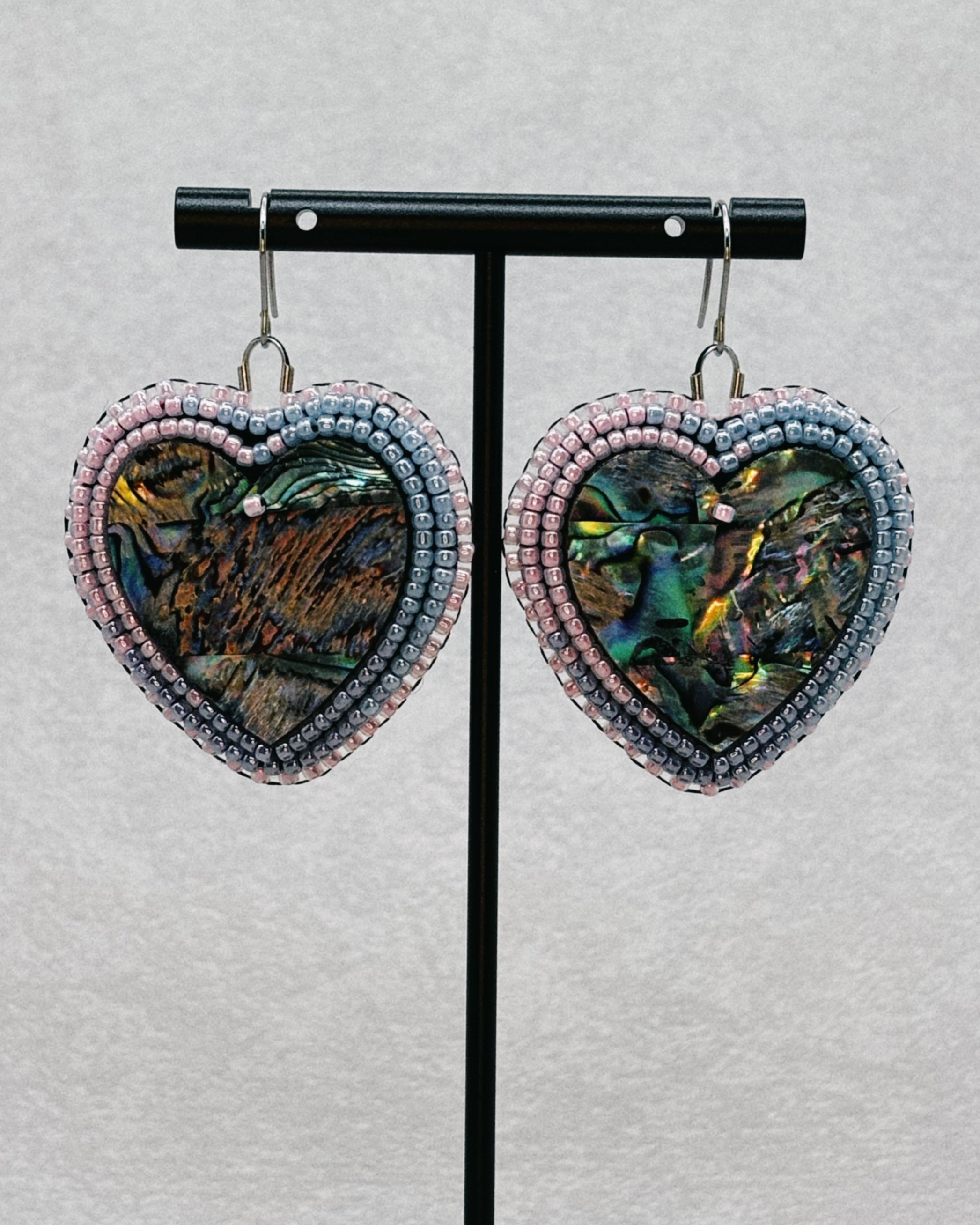 Pink, Purple, and Blue Beaded Abalone Hearts featuring iridescent shell hearts framed by layered pink, purple, and blue seed beads