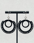 Black Brick Stitch Hoop Dangles featuring double black hoops with intricate beadwork and silver hook accents on a neutral backdrop