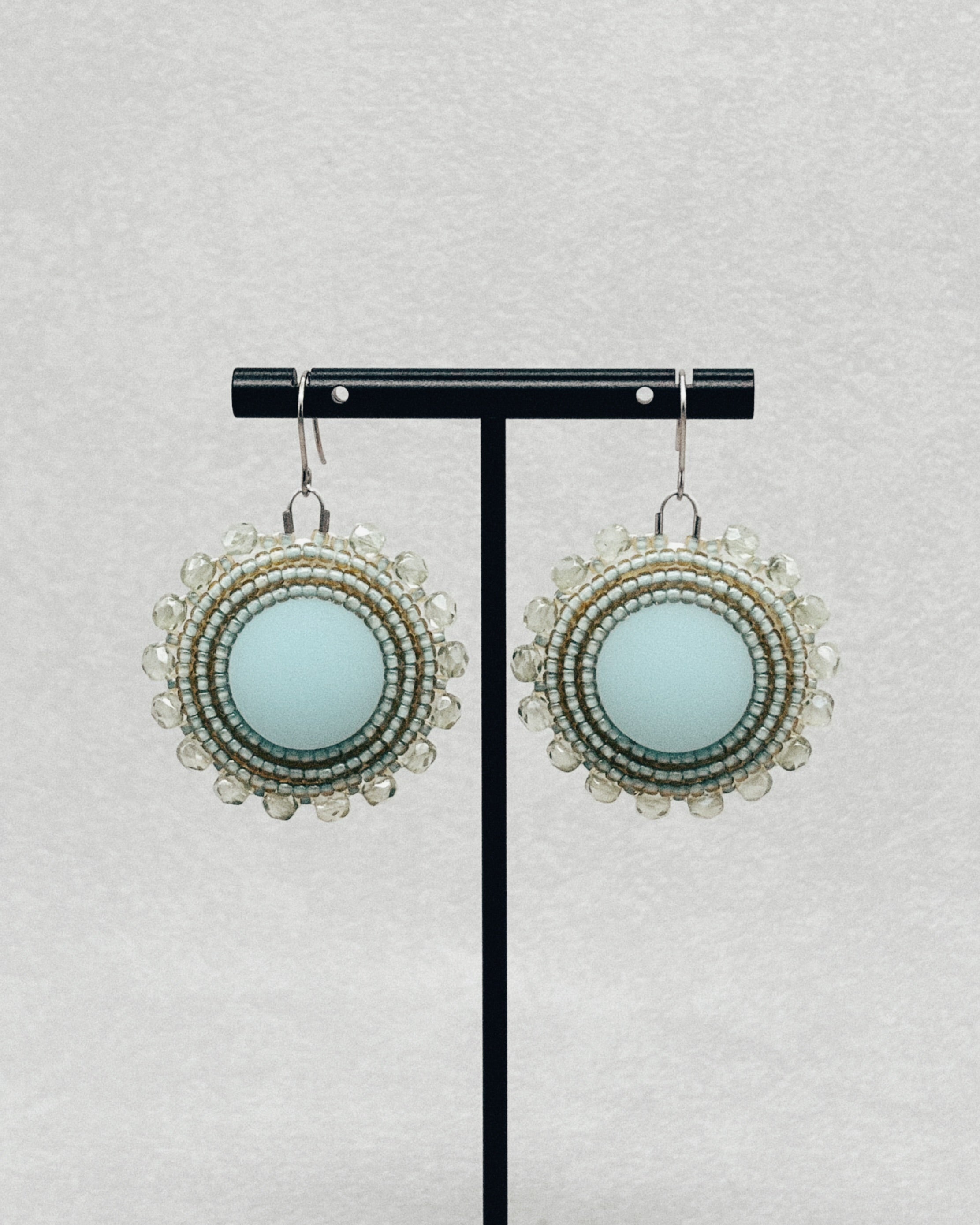 Seafoam Beaded Dangles handmade beaded earrings with round seafoam centers and layered glass beadwork