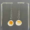 Silver Shaggy Dangles with Clamshells featuring 3-inch chainmail drops and natural shell accents in lightweight design