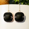 Matte Black and Pink Square Dangles featuring flat-stitched matte black and translucent pink beads for a refined look