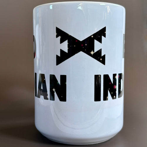 Bad Indian Mug, Galaxy Print featuring bold black text and geometric design with vibrant galaxy pattern on white ceramic mug.