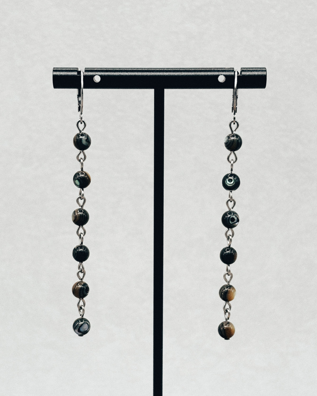 Long Abalone Sphere Huggie Dangles with cascading dark abalone spheres