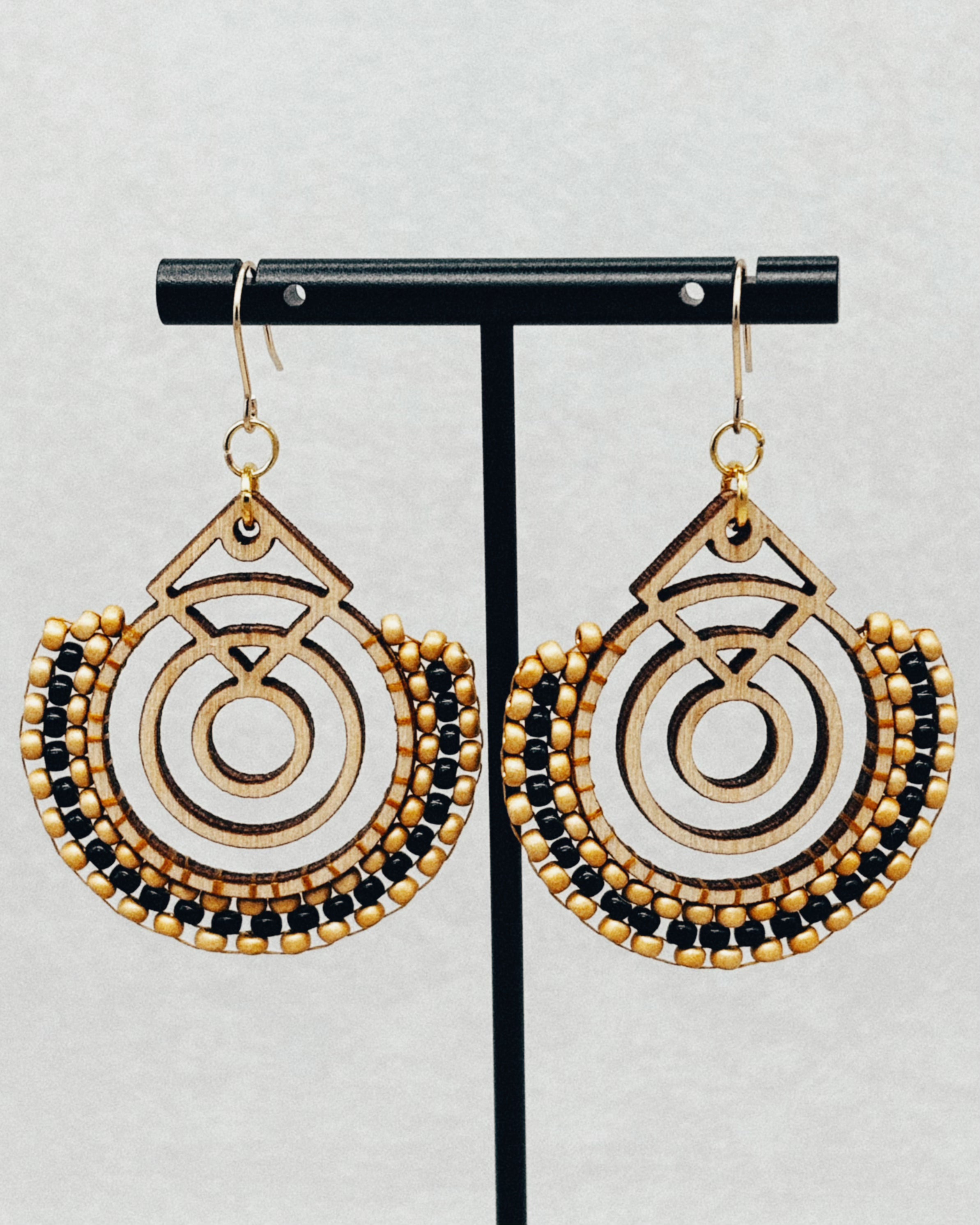 Birch Brick Stitch Hoop Dangles featuring geometric wooden shapes with black and light brown bead embellishments