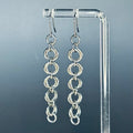 Steel Swirl Dangles featuring linked chainmail rings with an elegant 2 3/4 inch drop length and lightweight design