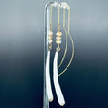 Delicate Dentalium and Mother of Pearl Drops with gold chain, showcasing handmade indigenous jewelry elegance.