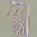 Silver Tiered Swirl Dangles with four graduated swirl tiers, lightweight chainmail design, 1 7/8 inch length