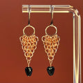 Copper Chainmail Dangles with Glass Triangle Bead featuring bright copper woven chainmail and black glass bead drops, lightweight design