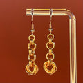 Copper Reinforced Swirl Dangles with bright copper chainmail links, 2 5/8 inch lightweight and bold indigenous earrings design