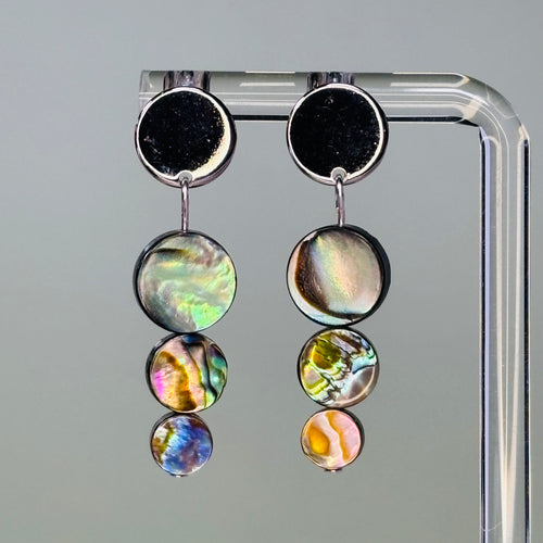 Abalone Triple Coin Silver Circle Studs featuring three iridescent abalone discs with shiny silver circle tops in a dangling design