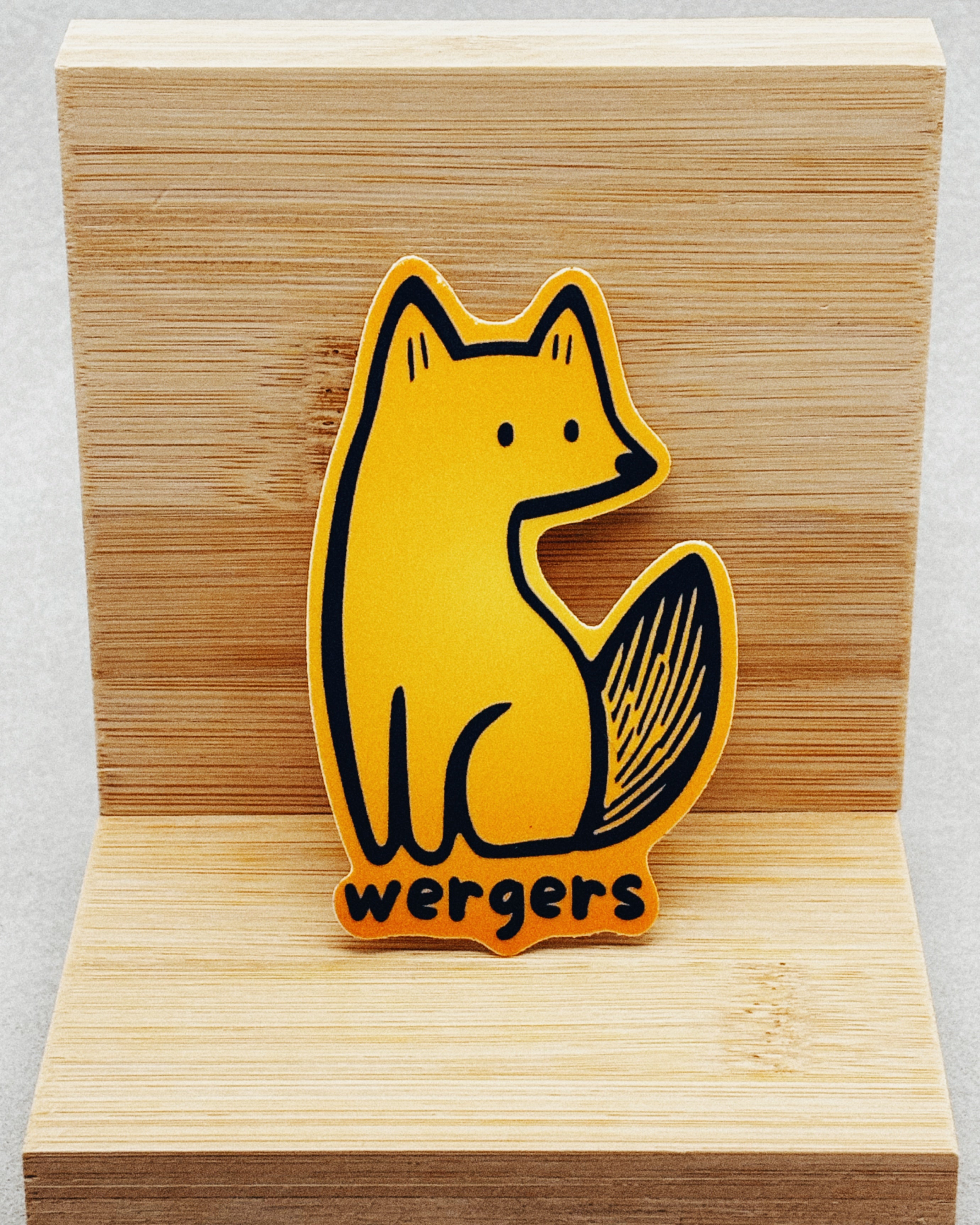 Yurok Vocabulary Stickers featuring a stylized yellow fox illustration with hand-drawn black accents on wood backdrop