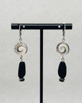 Black Lip Swirl Dangles featuring spiral shell details with elongated black stone and small bead accents, handmade indigenous jewelry.