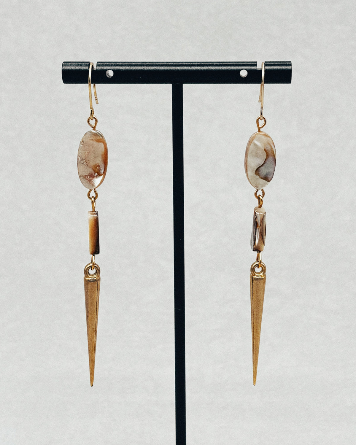 Double Abalone Spike Dangles with oval abalone stones and tapered spike charms on gold-tone hooks